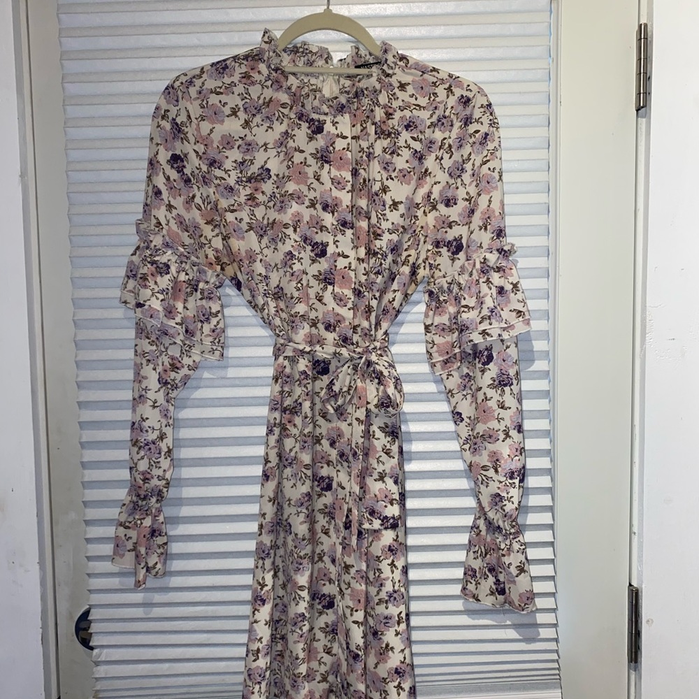 Beautiful purple floral high neck and long ruffle sleeved dress! Worn once:)